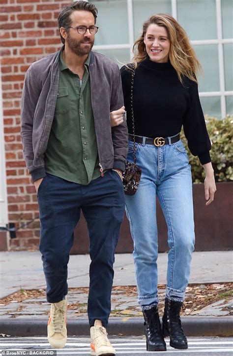 Blake Lively models Gucci belt as she strolls arm in arm with 